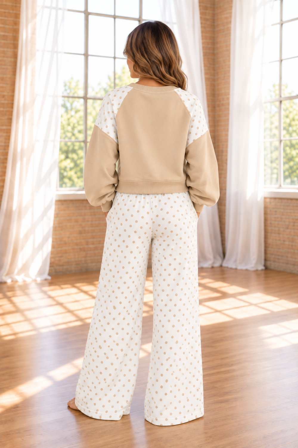 * Two-piece pant set
* Polka dot patchwork
* Round neck
* Long sleeve
* Drop shoulder
* Ribbed
* Oversized top
* Sits at waist
* High-waist
* Elastic waist
* Drawstring
* Pocketed
* Wide leg
* Slightly stretchy