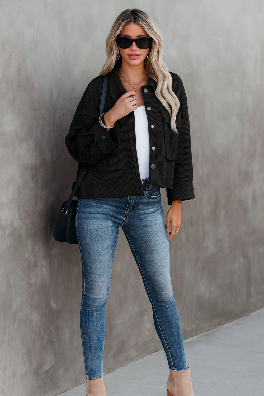 Jacket, collared, oversized, distressed, pleated, drop shoulder, buttoned, pocketed, long sleeve, waffle-knit, exposed seam, sits at the waist, pleated, adjustable straps, some stretch front view