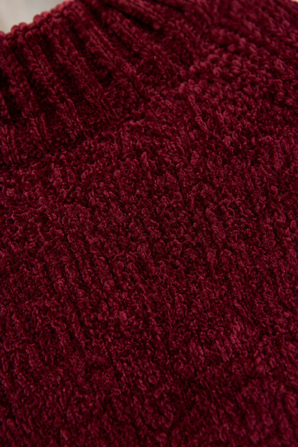 * Mock neck sweater
* Textured knit
* Drop shoulder
* Long sleeve
* Slightly stretchy