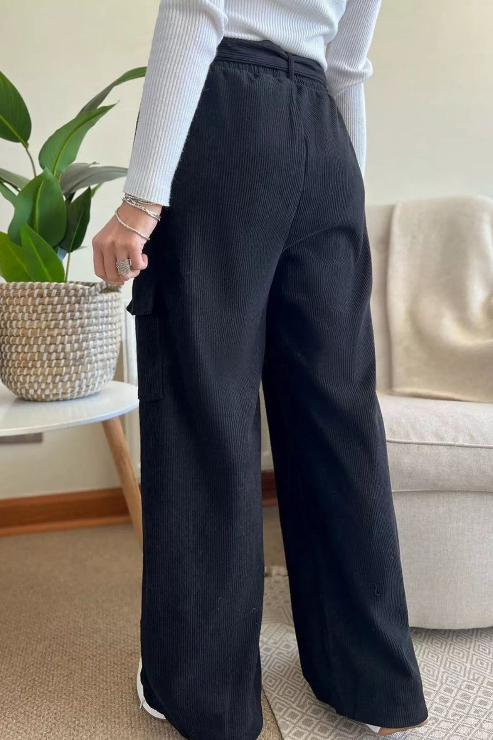 Pants, high-waist, belted, looped, elastic waist, wide leg, corduroy, front and side pockets, not stretch, back view
