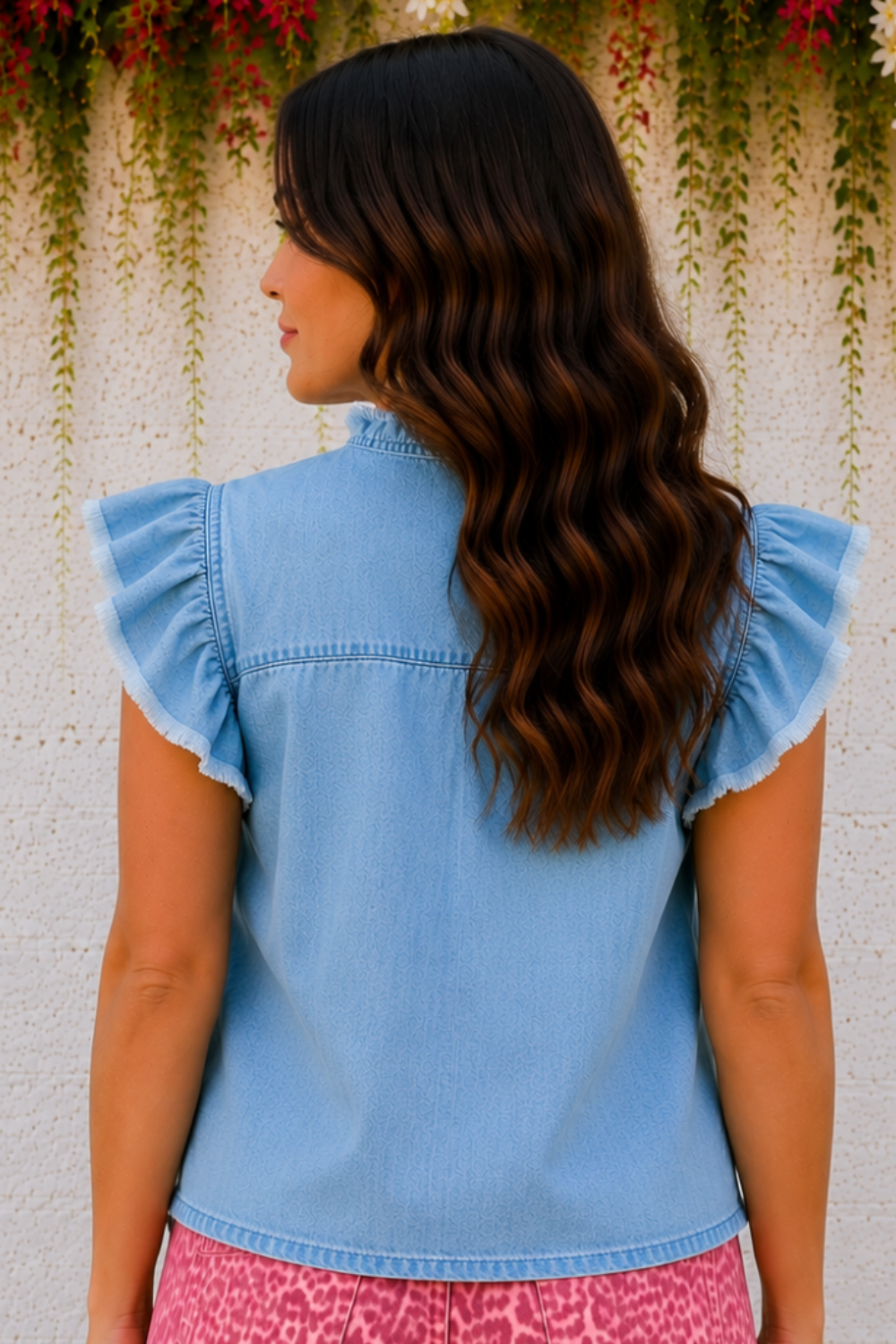 * Round ruffle neck
* Flutter distressed sleeve
* Denim
* Pearl style keyhole closure
* Pleated
* No stretch 
