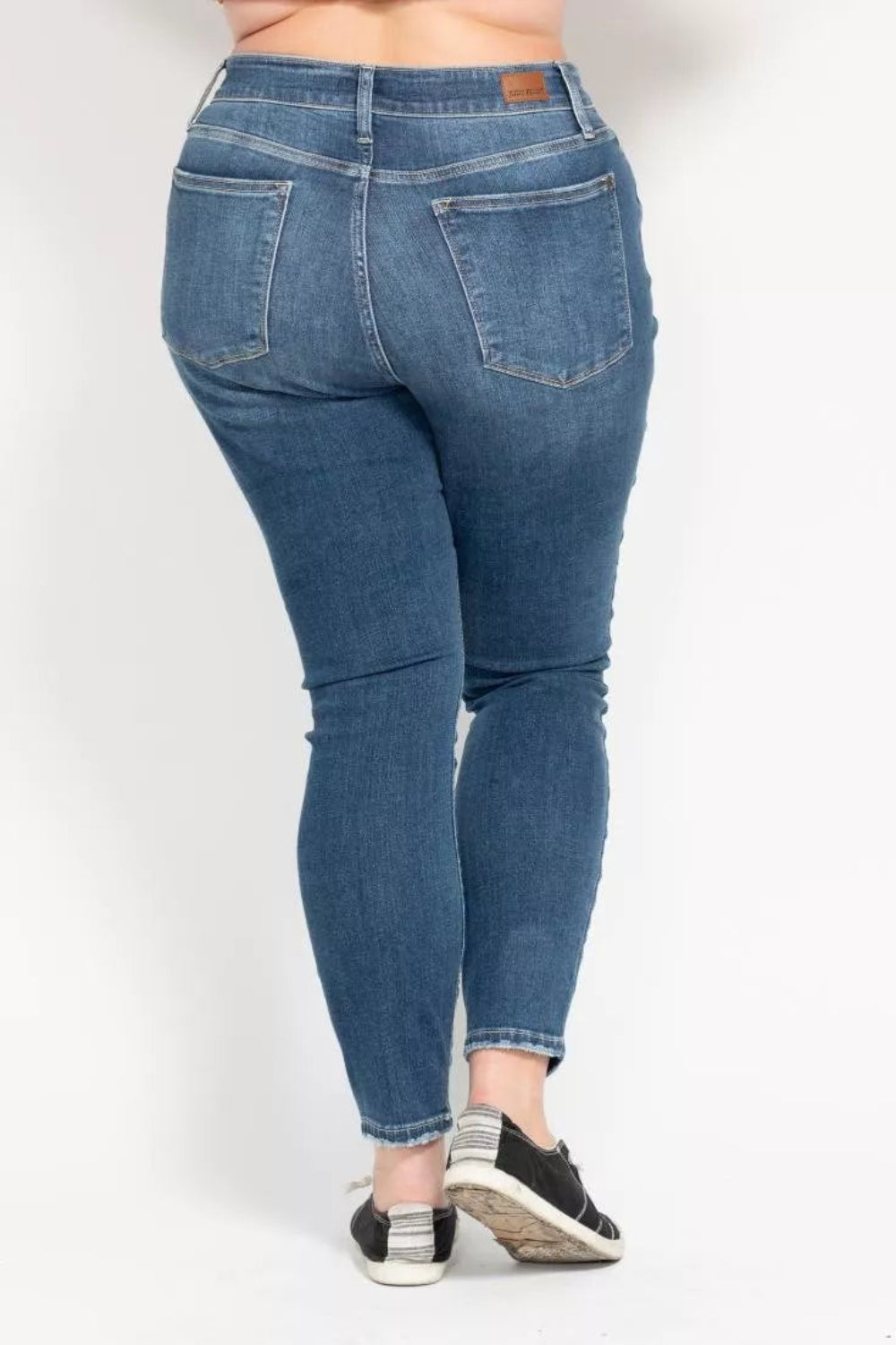 Judy Blue Jeans, full-size, high-rise, button fly, pocketed, belt loops, skinny leg, medium wash, slightly stretchy, back view