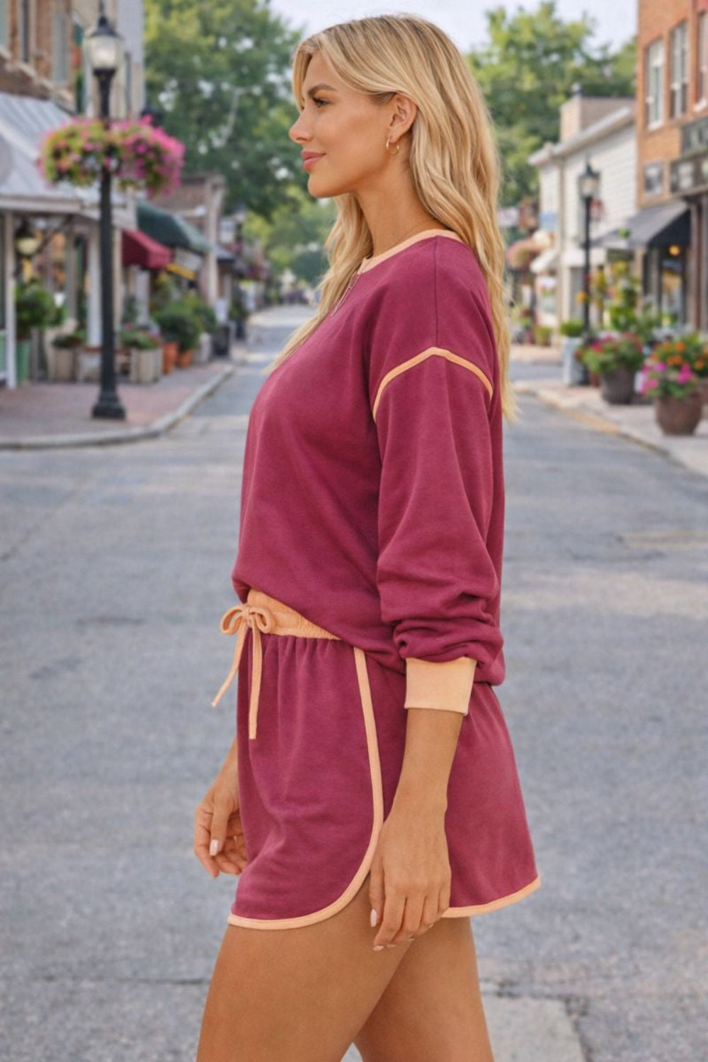 two-piece skort set, contrast trim, long sleeve, round neck, drop shoulder, ribbed, elastic waist, drawstring, pockets, slightly stretchy, side view