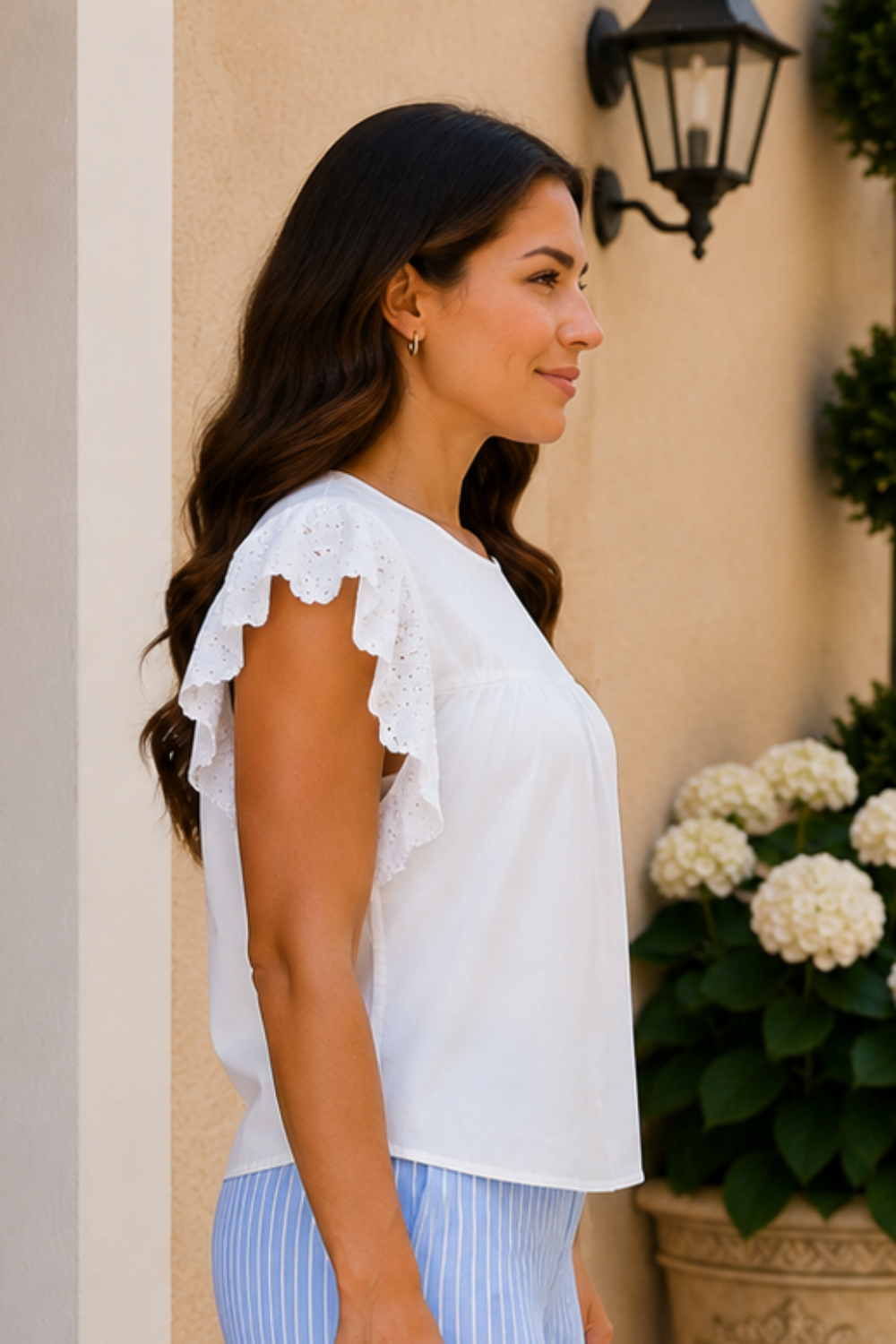 * Round neck
* Flutter sleeve
* Pleated
* Ruffled
* Lace detail
* No stretch