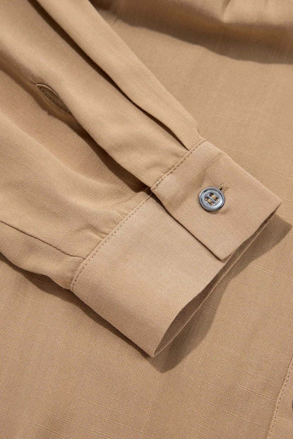Shirt, long sleeve, collared neck, buttoned, waffle-knit, patchwork, pleated, frayed hem, stretchable, close up view