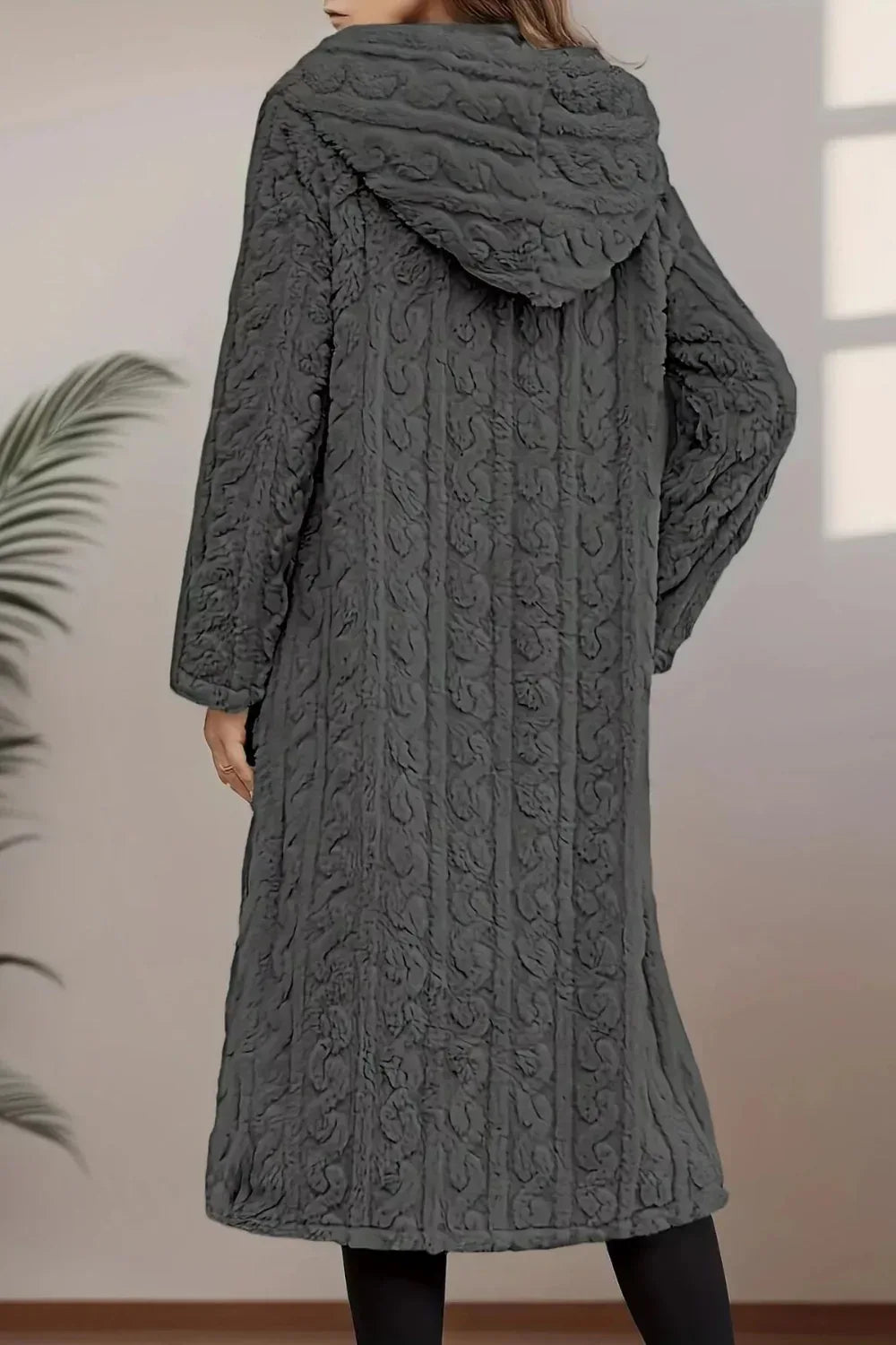 Longline coat, hooded, buttoned, pocketed, thick, lined, oversized, cable-knit design, some stretch, back view