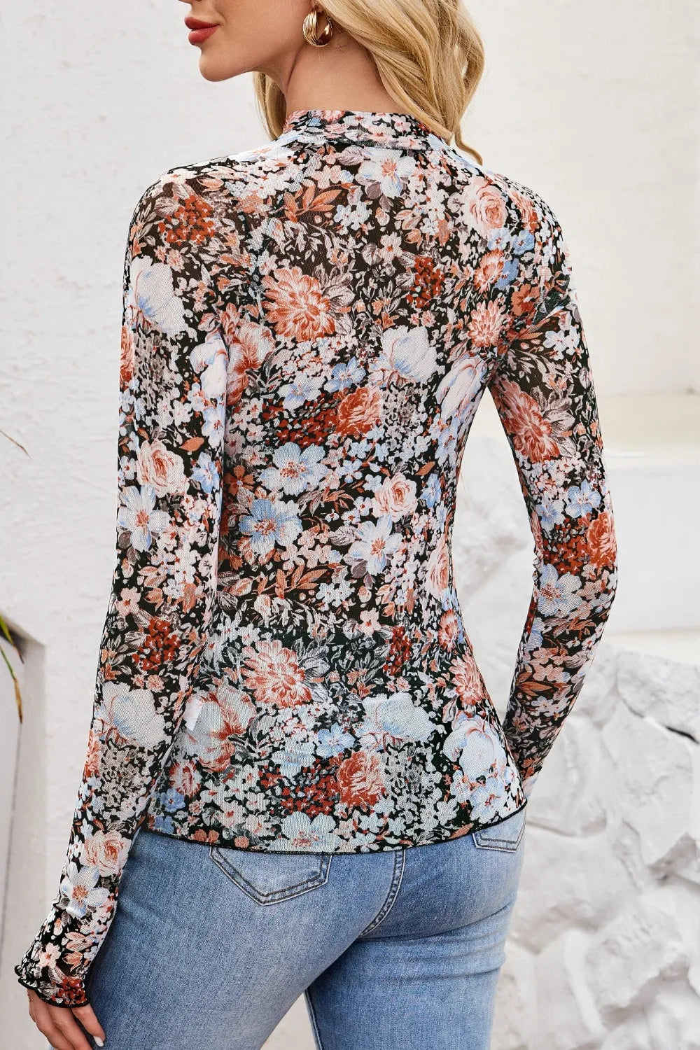 top, mesh, floral print, mock neck, long sleeve, thumb hole, stretchy, back view