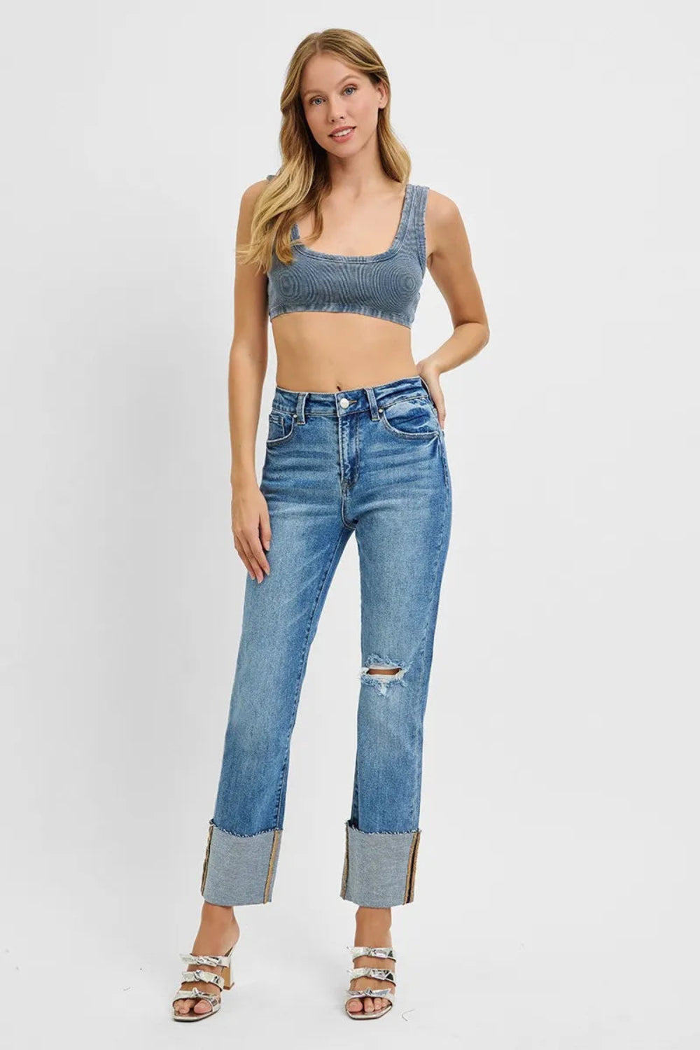 Risen jeans, full-size high-rise, wide cuffed, ankle length, straight leg, raw hem, distressed, vintage medium wash  5-pocket detail, button-zipper closure, belt looped, straight leg, ankle length, slightly stretchy, front view