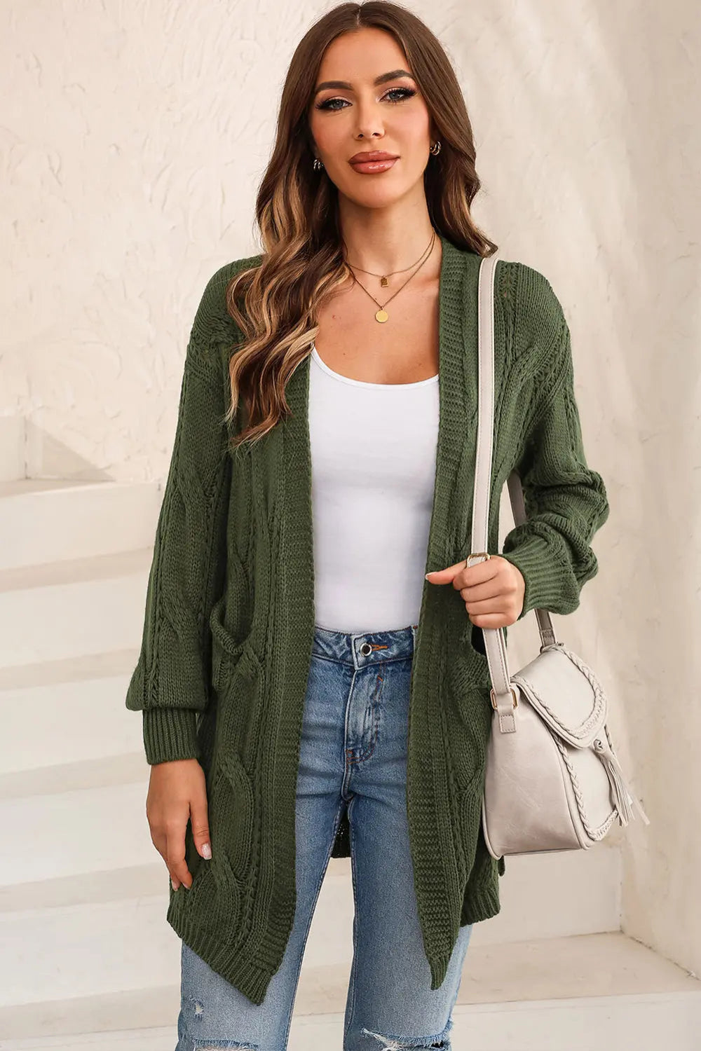 Cardigan, long sleeve, drop shoulder, open front, cable-knit, side slit, openwork, no buttons, pocketed, stretchy front view
