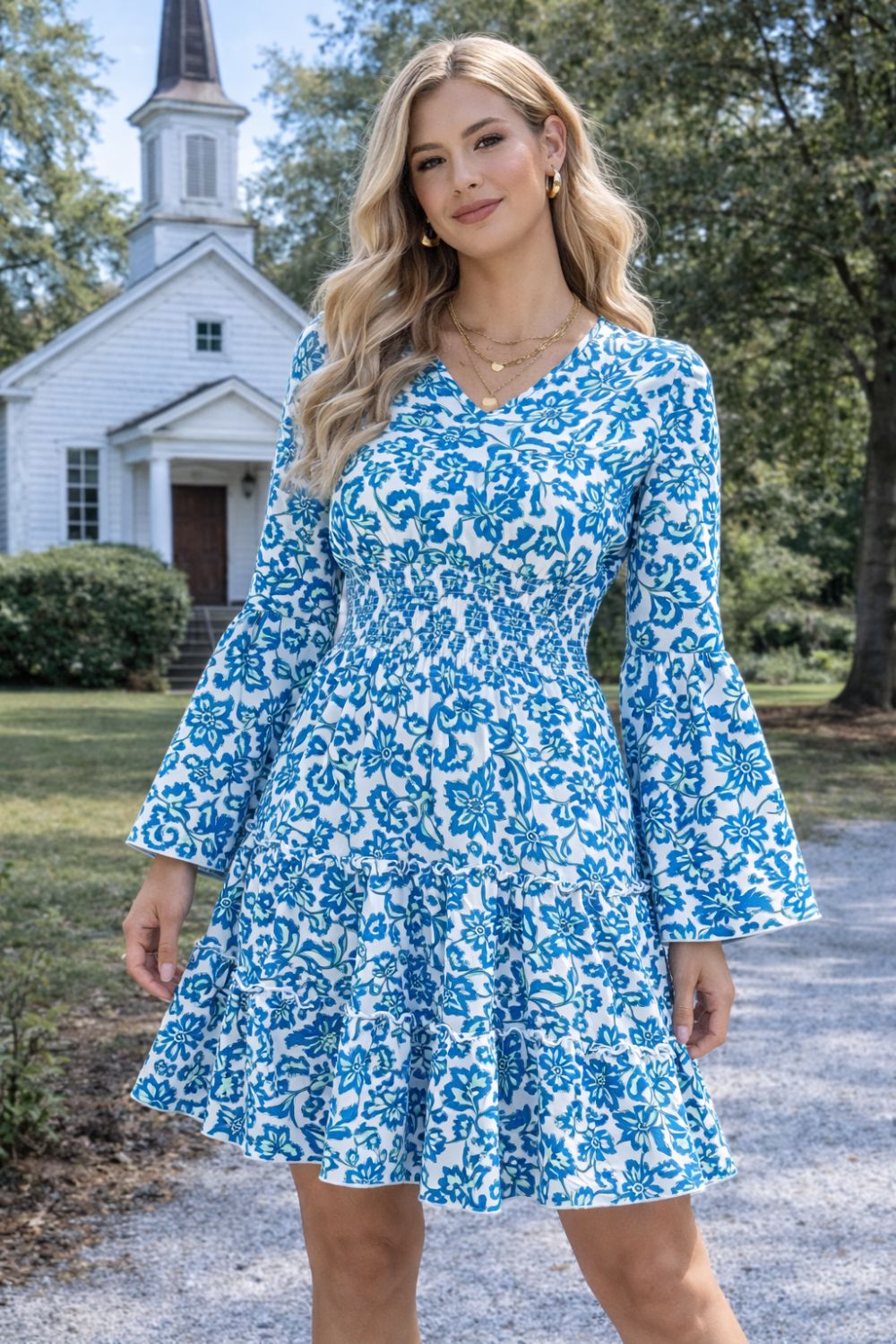 * Midi Dress
* Smocked
* Long flared sleeve
* V-neck
* Tiered
* Ruffle hem
* Unlined
* Slightly stretchy