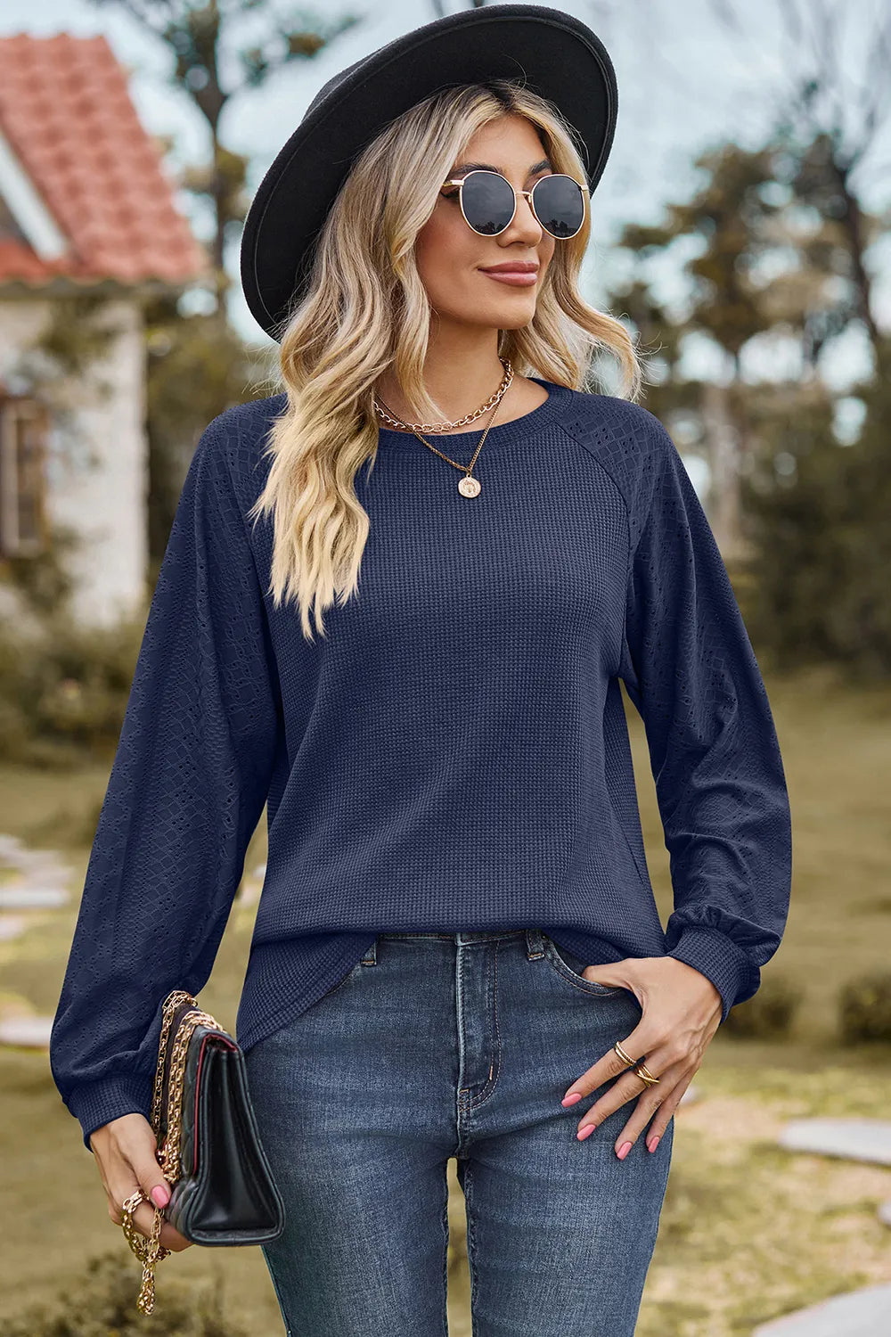Top, raglan style, round neck, long sleeve, eyelet sleeves, ribbed, opaque, slightly stretchy, front view
