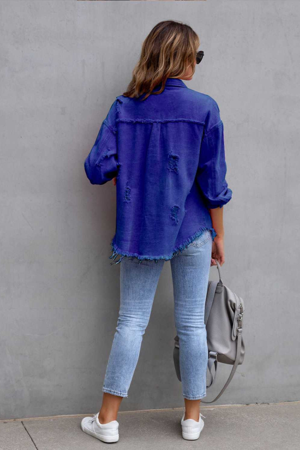 denim jacket, long sleeve, collared, buttoned, buttoned front patch pockets, distressed, fringed/raw hem, no stretch, multiple colors, back view
