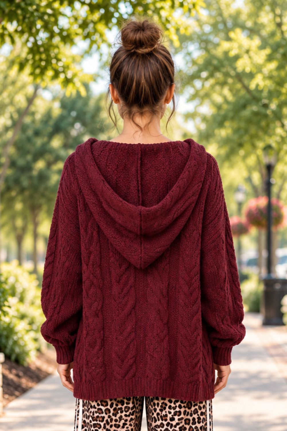 * Sweater
* Hooded
* Long sleeve
* Cable-knit
* Oversized
* Slightly stretchy
