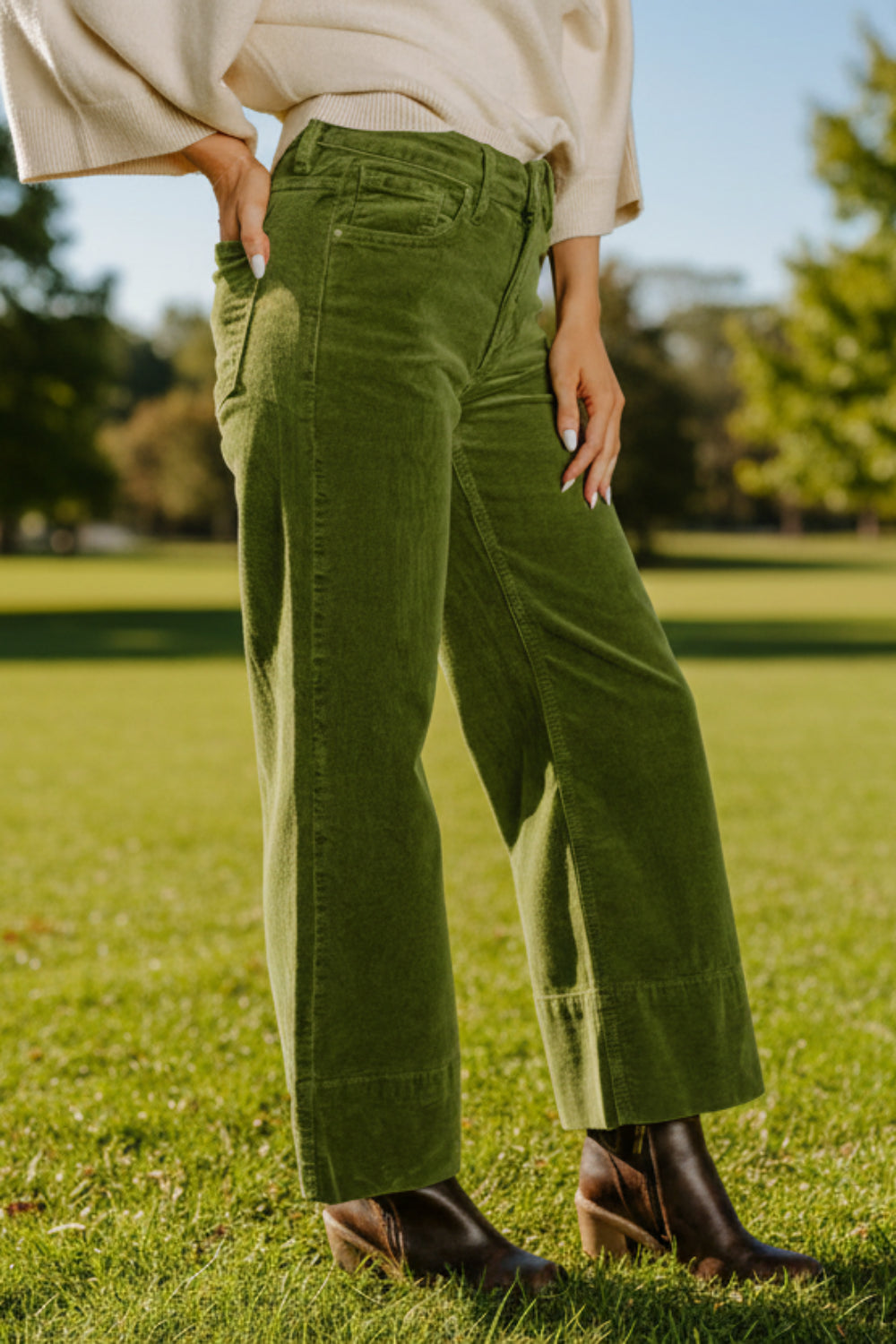 Pants, corduroy, high waist, wide leg, pocketed, belt loops, button/zipper closure, some stretch, side view