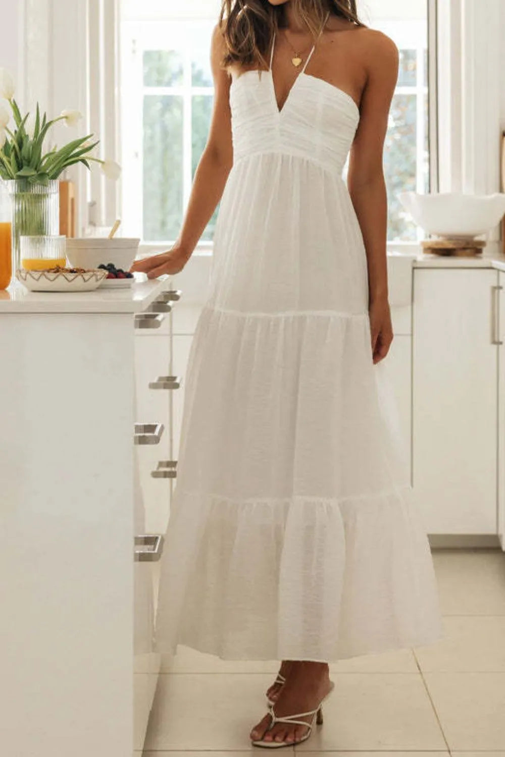 Maxi dress, back zipper, halter tied, v-neck, ruched, tiered, ruffled, partially lined, no stretch, front view