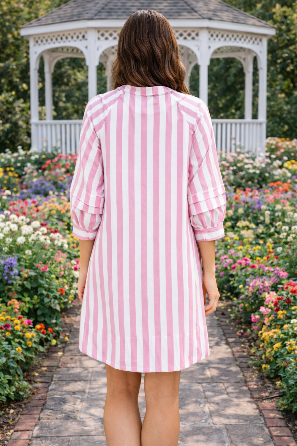 * Mini dress
* Notched neck
* 3/4 sleeves
* Buttoned
* Unlined
* Striped
* No stretch