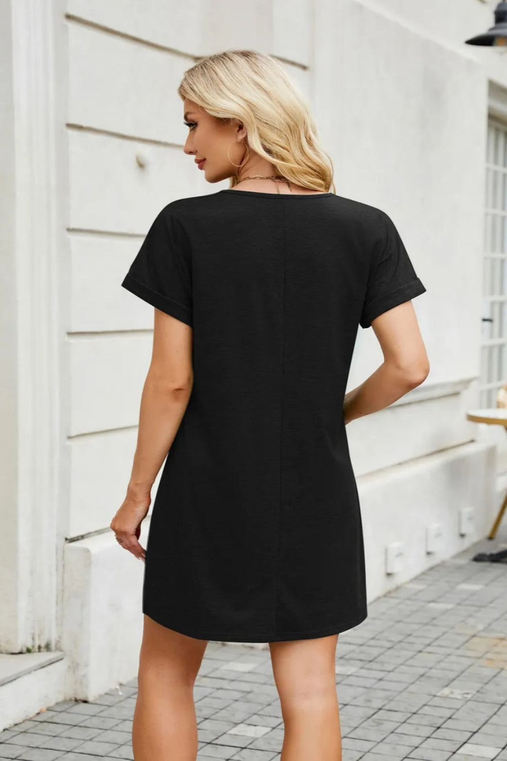 T-shirt dress, mini, v-neck, rolled sleeves, moderate stretch, short sleeve, opaque, unlined back view
