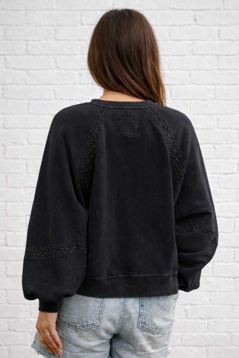 sweatshirt, washed, pullover, long sleeve, notched neck, raglan style, lace detail, oversized, slightly stretchy, back view