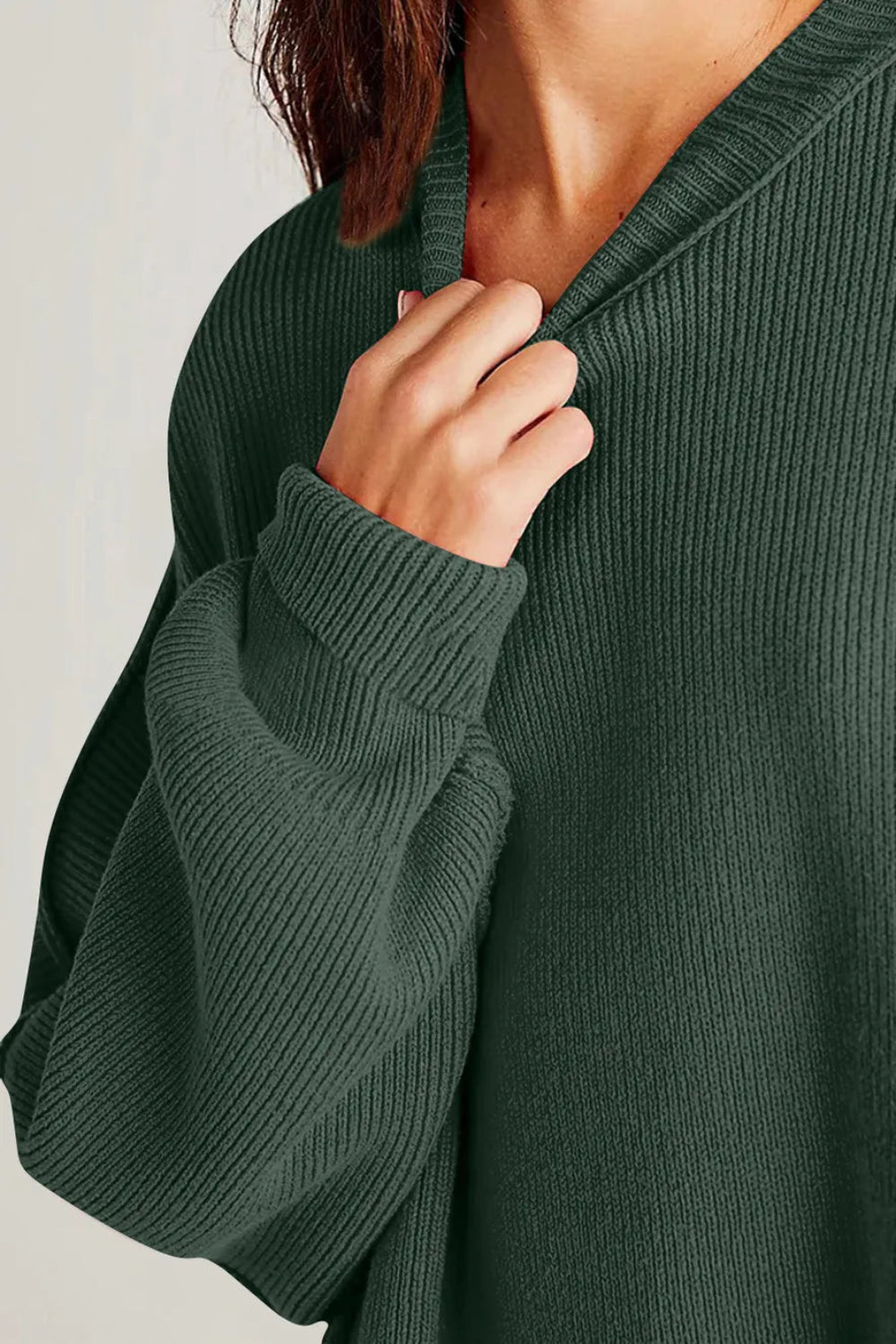 Sweater, oversized, drop shoulder, round neck, exposed seam, long, side slit, ribbed, stretchy front view
