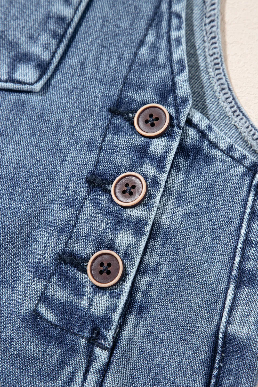 distressed, bib, pocket, wide-leg, denim overalls close up view