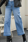 Jeans, high-rise, drop hem, raw hem, wide leg, pocketed, belt loops, button/zipper closure, vintage wash, some stretch, front view