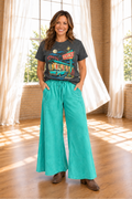 * Pants
* High-waist
* Palazzo style
* Drawstring
* Elastic waist
* Pocketed
* Wide leg
*. Rolled hem
* Exposed seam
* No stretch