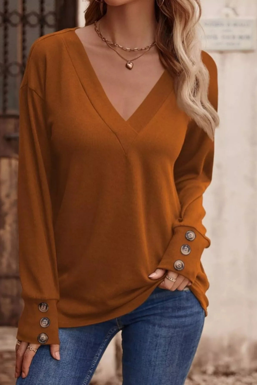 top, long sleeve, drop shoulder, v-neck, pullover, decorative buttons, straight hem, comes in many colors, stretchy, front view