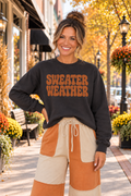 Sweater Weather Graphic Sweatshirt in black with bold rust-orange retro lettering, shown from the front.
