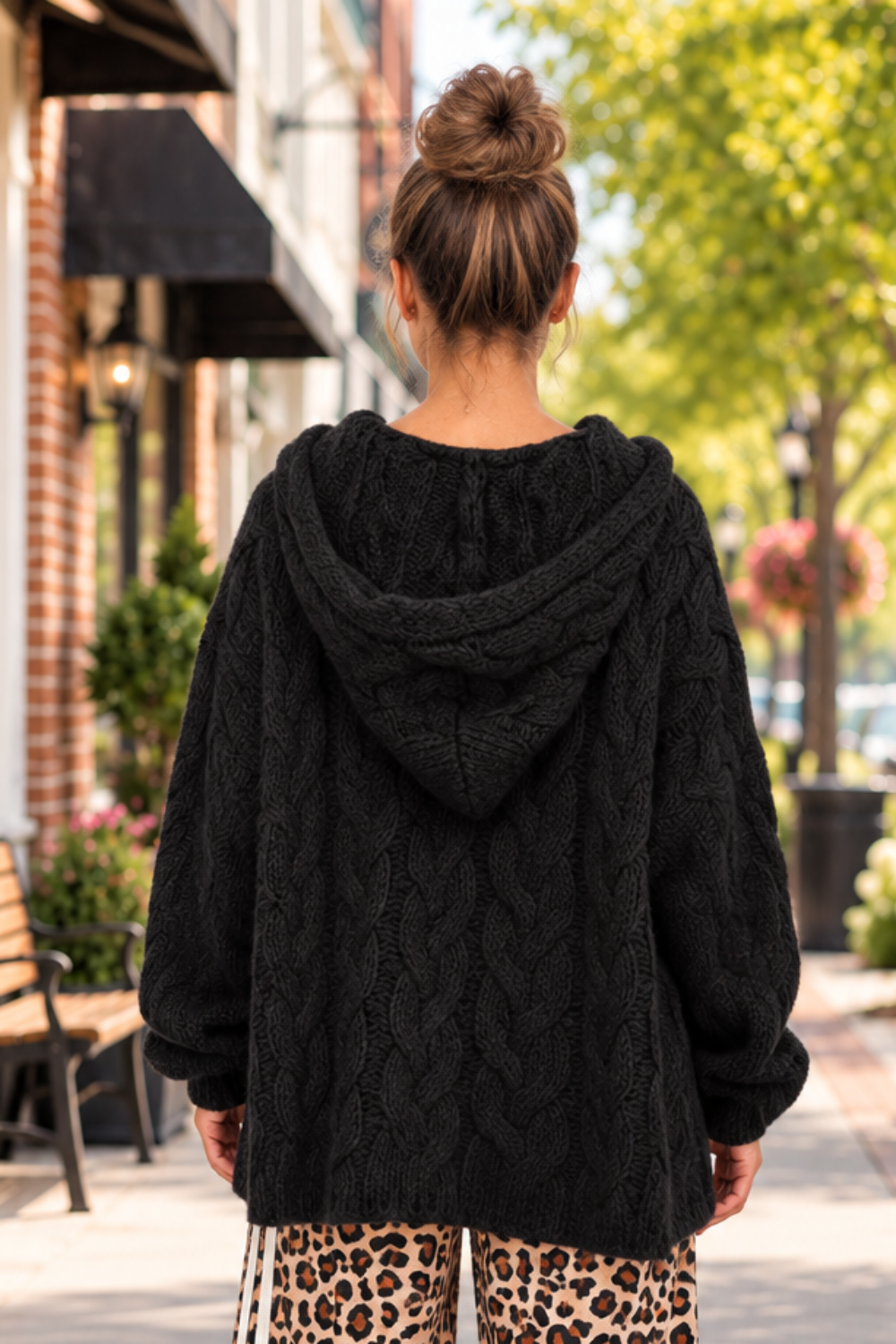 * Sweater
* Hooded
* Long sleeve
* Cable-knit
* Oversized
* Slightly stretchy