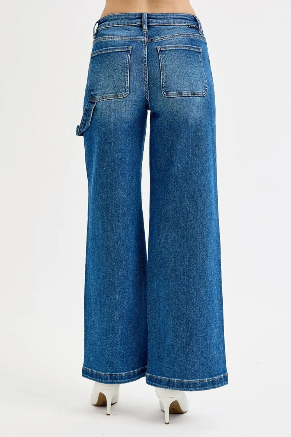 Risen Jeans, full-size, high-rise, darted, wide leg, one side hammer loop, pocketed, belt loops, button/zipper closure, washed, raw hem, slightly stretchy, front view
