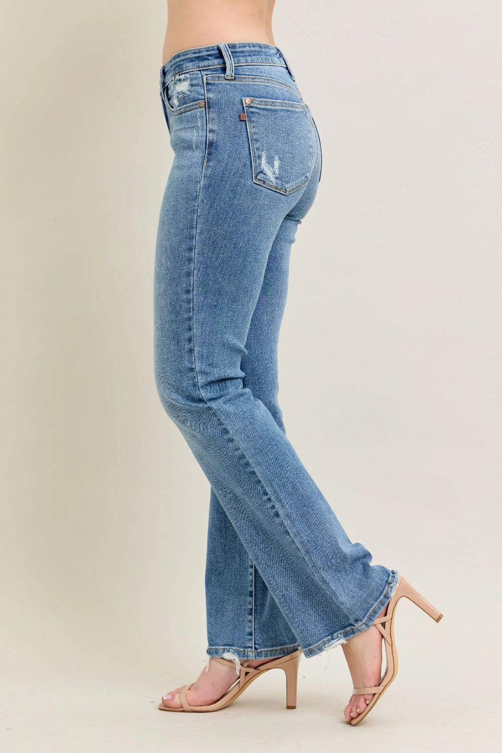 Judy Blue Jeans, mid-rise, full-size, washed, pocketed, raw hem, bootcut, slightly stretchy side view