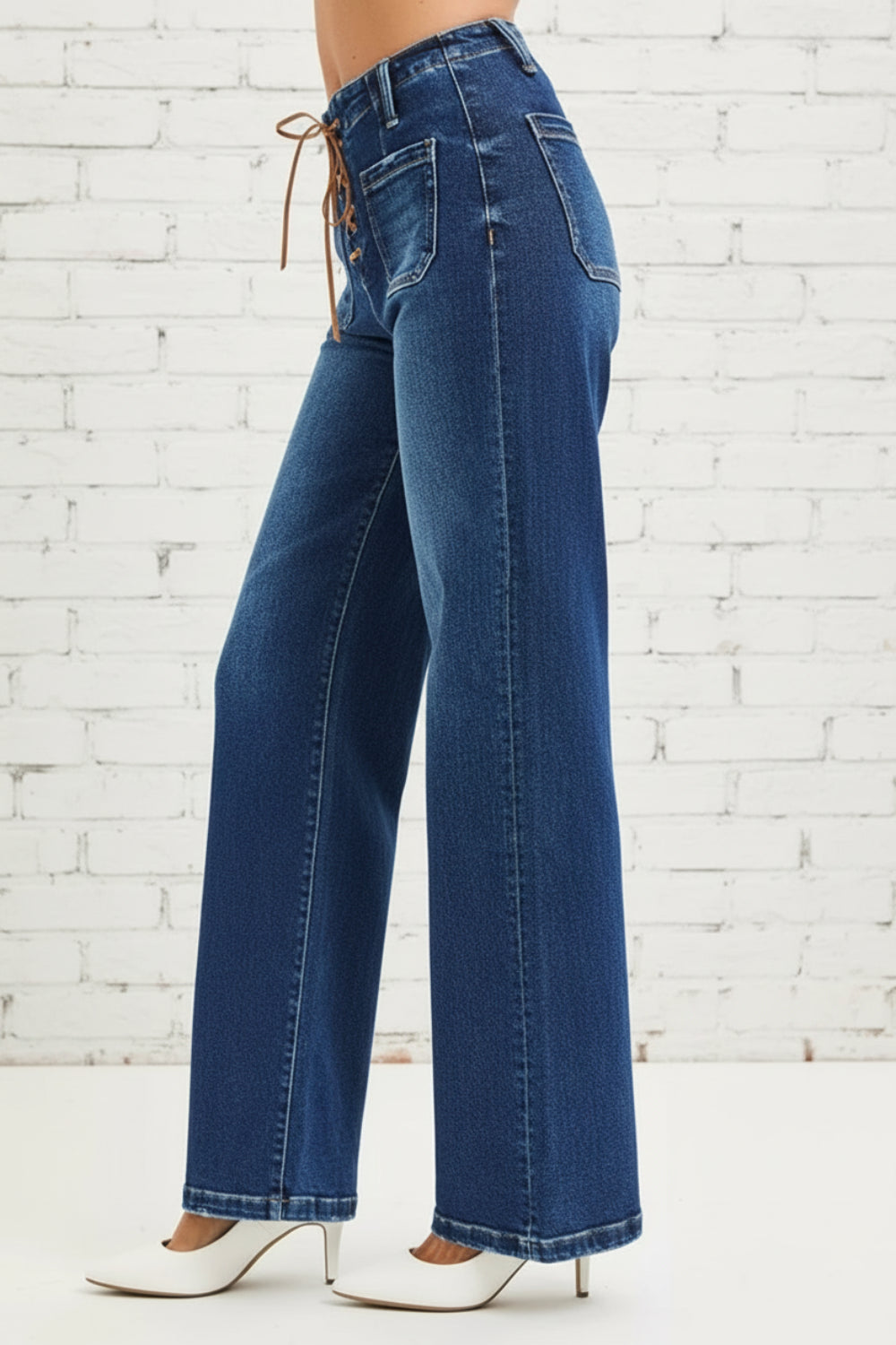 Risen Jeans, full-size, high-rise, wide leg, lace up closure, front patch pockets, back pockets, belt loops, dark wash, slightly stretchy, side view