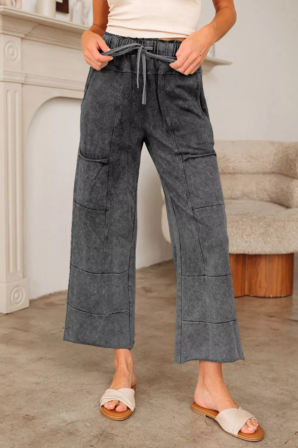 Pants, mineral wash, drawstring, elastic waist, raw hem, pocketed, high waist, wide leg, some stretch, front view
