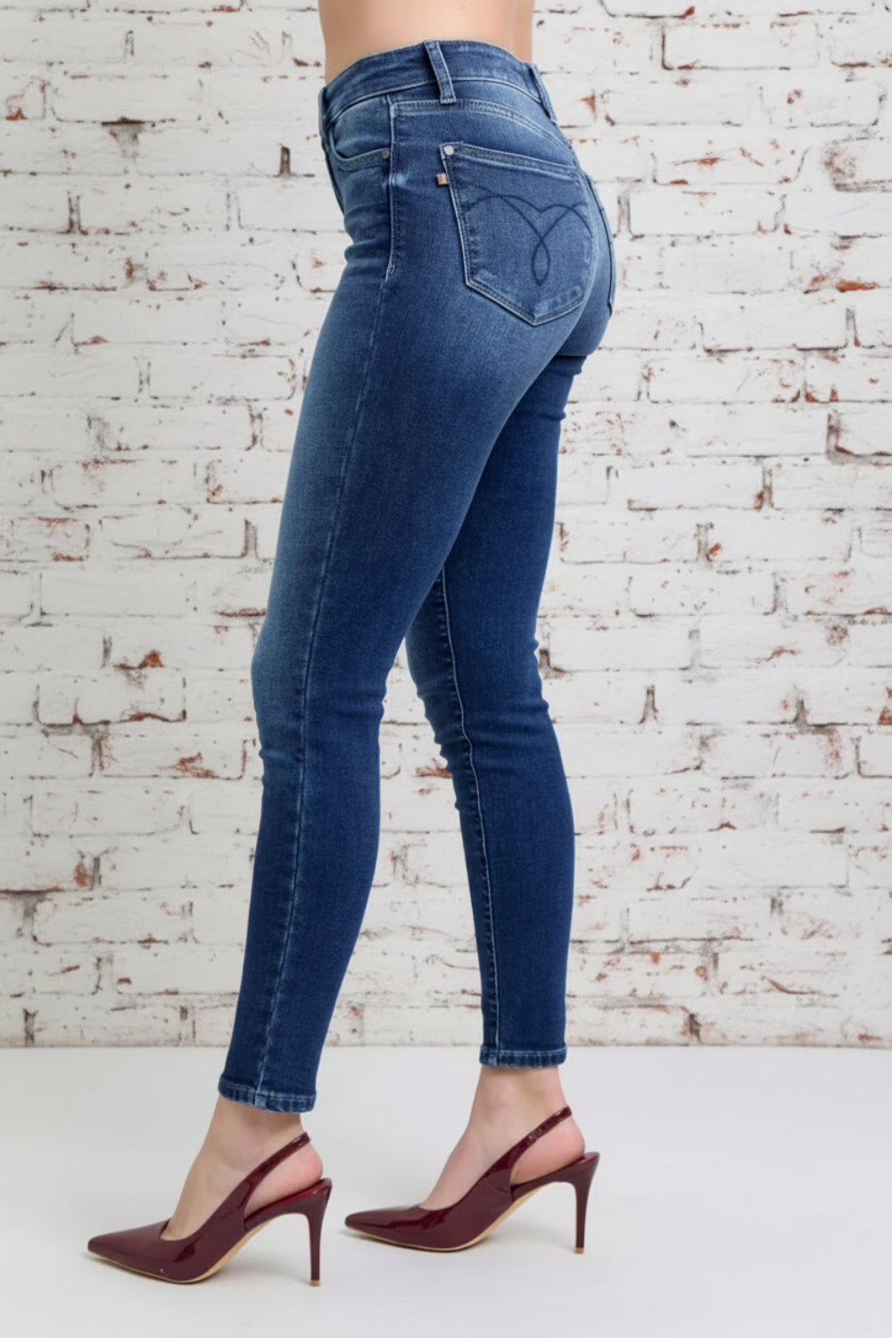 Judy Blue Jeans, full-size, high-rise, thermal, skinny, pocketed, belt loops, button/zipper closure, dark vintage wash, stretchy, side view