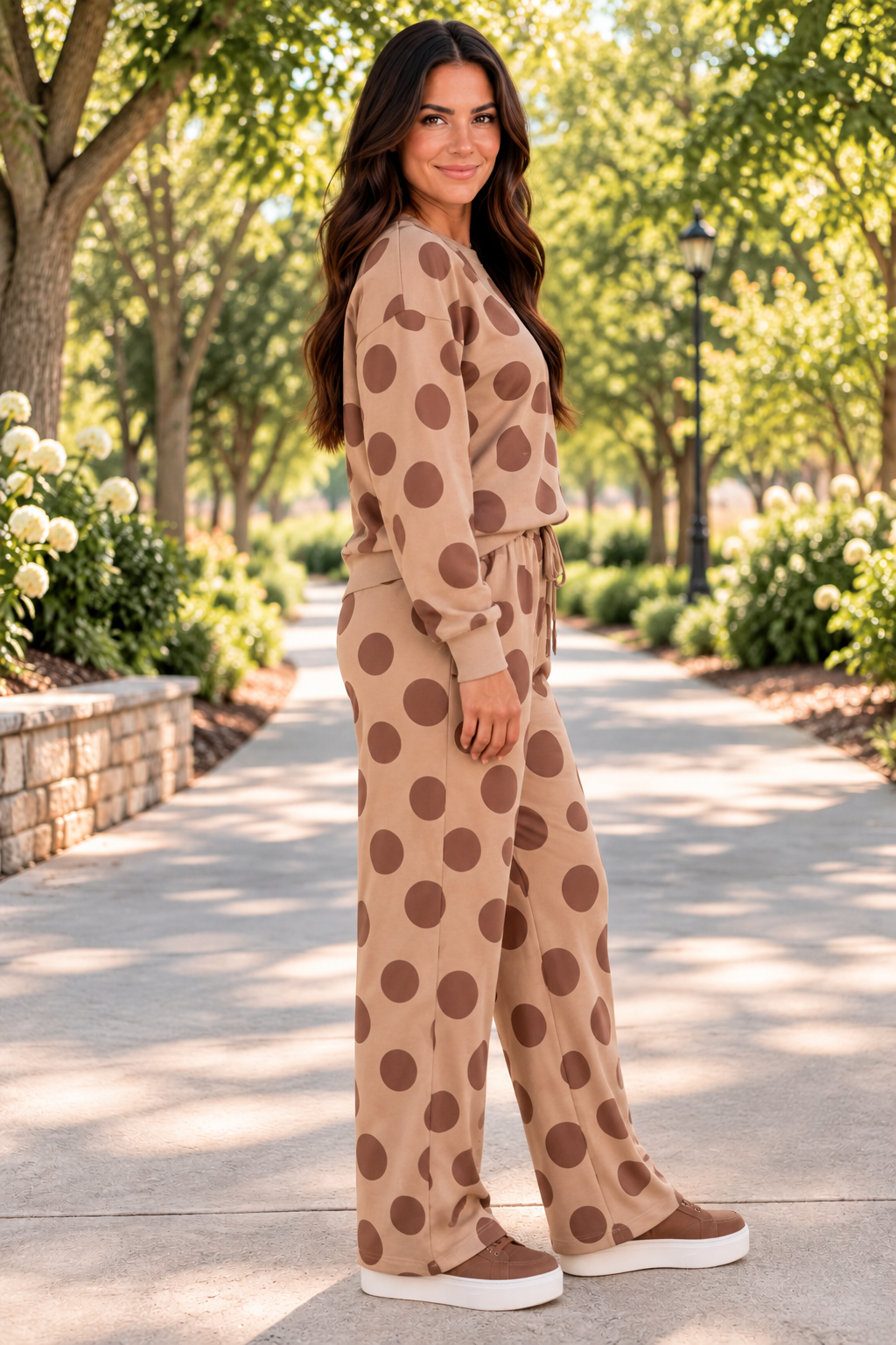 Point Taken Pant Set In Brown with an brown-and-tan polka-dot sweatshirt and matching wide-leg drawstring pants side view.