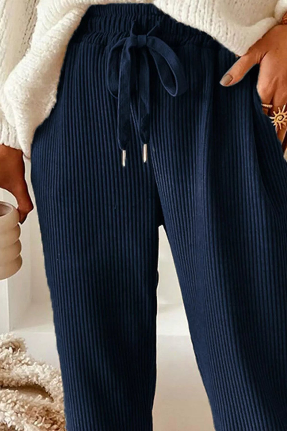 Pants, corduroy, drawstring, pocketed, elastic waist, high-rise, straight leg, no stretch, front view close up