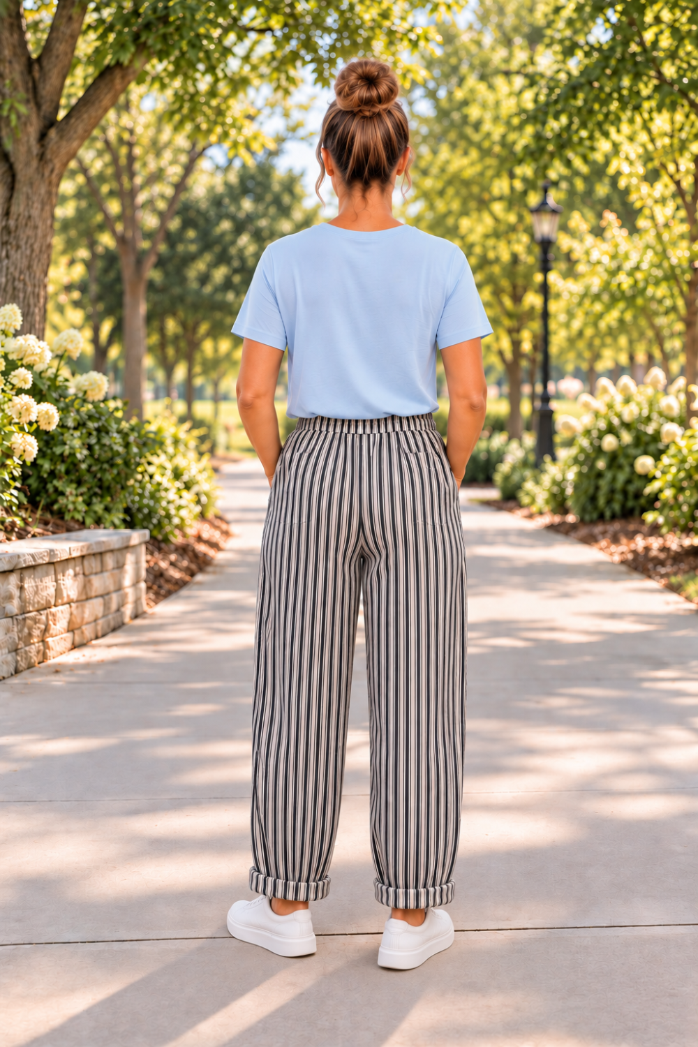 * Pants 
* High-waist
* Striped
* Elastic waist
* Drawstring
* Pocketed
* Pleated
* Loose fit
* Wide-leg
* No stretch