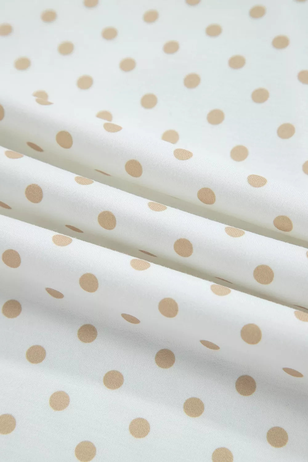 * Two-piece pant set
* Polka dot patchwork
* Round neck
* Long sleeve
* Drop shoulder
* Ribbed
* Oversized top
* Sits at waist
* High-waist
* Elastic waist
* Drawstring
* Pocketed
* Wide leg
* Slightly stretchy