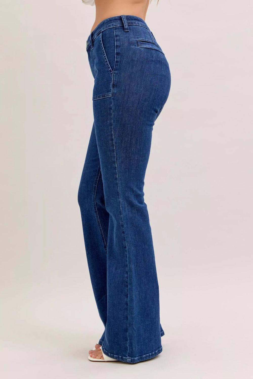 Judy Blue Jeans, high-rise, front patch pockets, flared, dark wash, belt loops, back pockets, button/zipper closure, slightly stretchy, side view