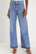 Jeans, high waist, wide leg, belt looped, pocketed, button/zipper closure, light wash, release hem, frayed hem, slightly stretchy, front view