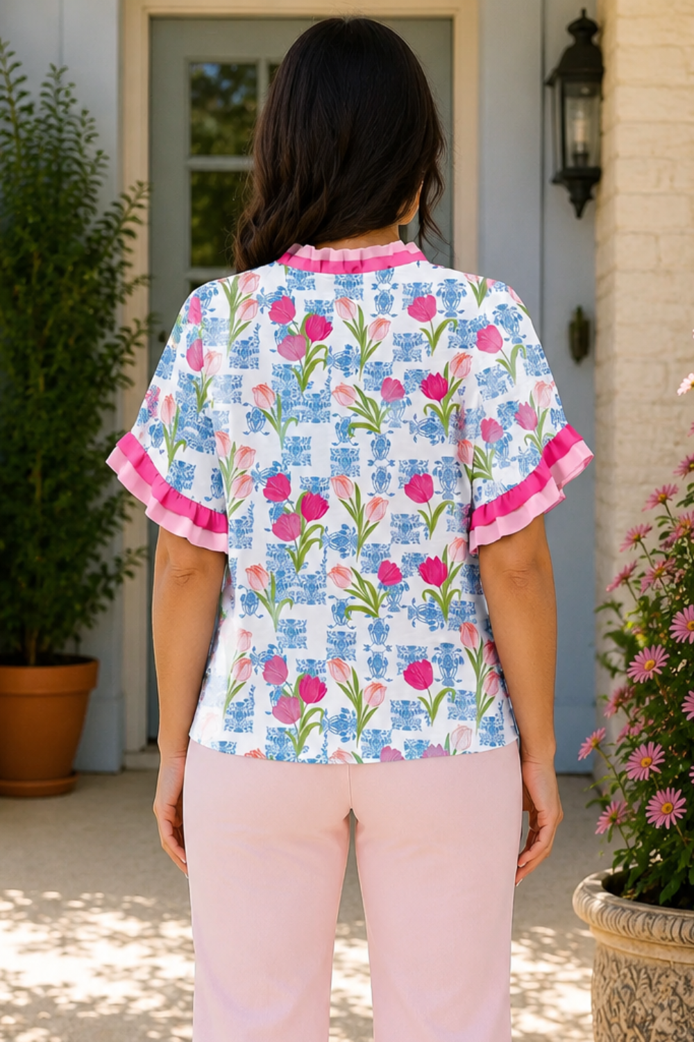 * V-neck
* Ruffled short sleeve
* Contrast trim
* Ruffled
* Textured
* No stretch