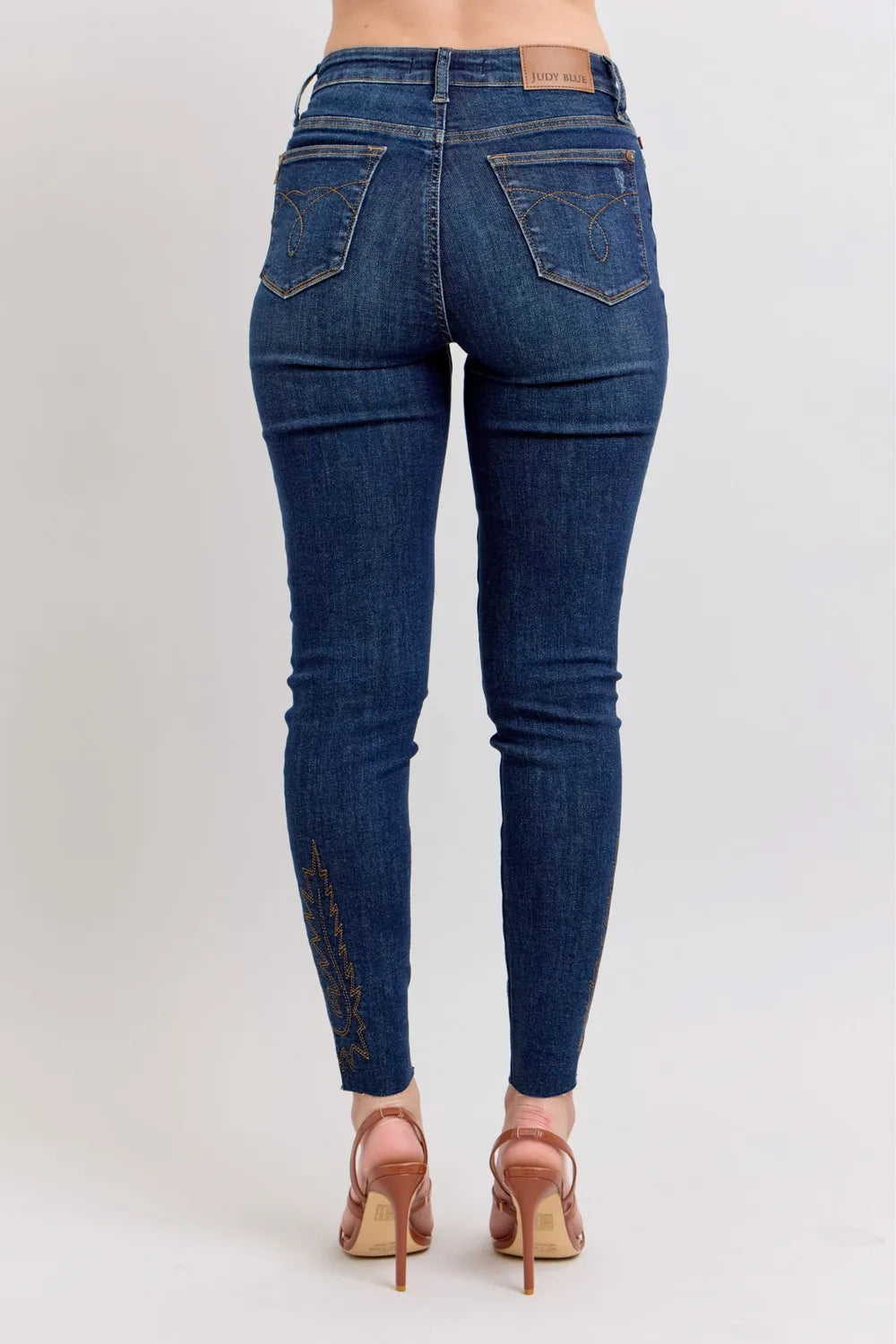 Judy Blue Jeans, full-size, high-rise, skinny, dark wash, pocketed, belt loops, button/zipper closure, embroidered, stretchy, back view