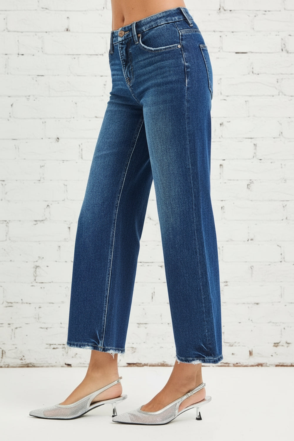 Risen Jeans, high-rise, tummy control, 4-way stretch, cropped, raw hem, wide leg, belt loops, pocketed, button/zipper closure, dark wash, slightly stretchy, side view