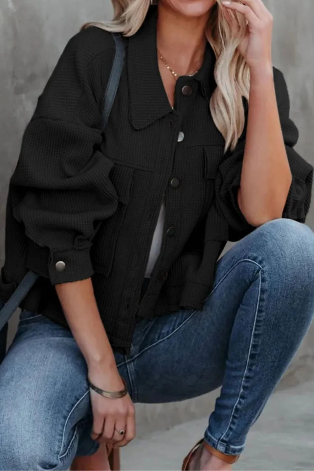 Jacket, collared, oversized, distressed, pleated, drop shoulder, buttoned, pocketed, long sleeve, waffle-knit, exposed seam, sits at the waist, pleated, adjustable straps, some stretch front view