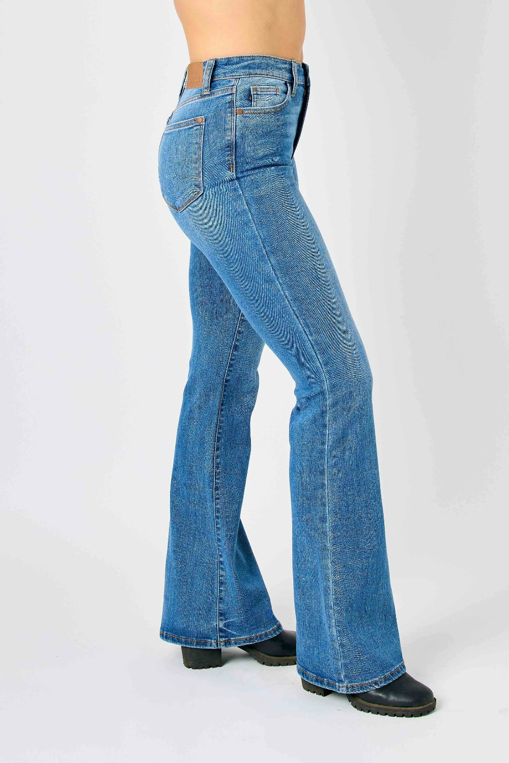 Judy Blue Jeans, full-size, high-rise, flared, pocketed, button and zipper closure, medium wash, slightly stretchy side view