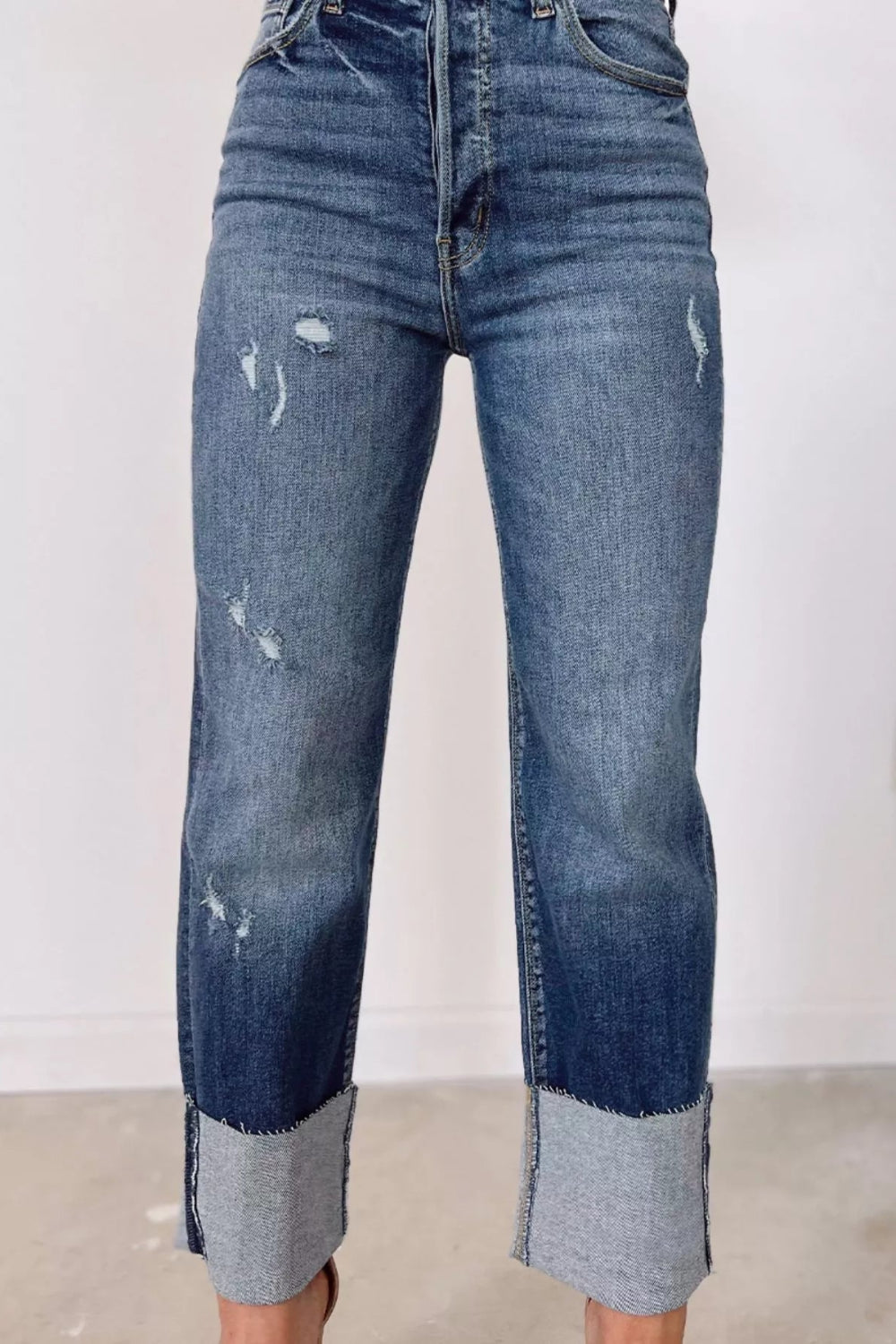 Jeans, straight leg, high-rise, distressed, pocketed, belt loops, raw hem, double button/zipper closure, slightly stretchy, front view
