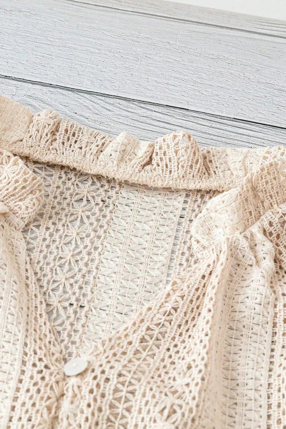 Shirt, long sleeve, crochet, ruffled v-neck, buttoned, unlined, slightly stretchy, close up view