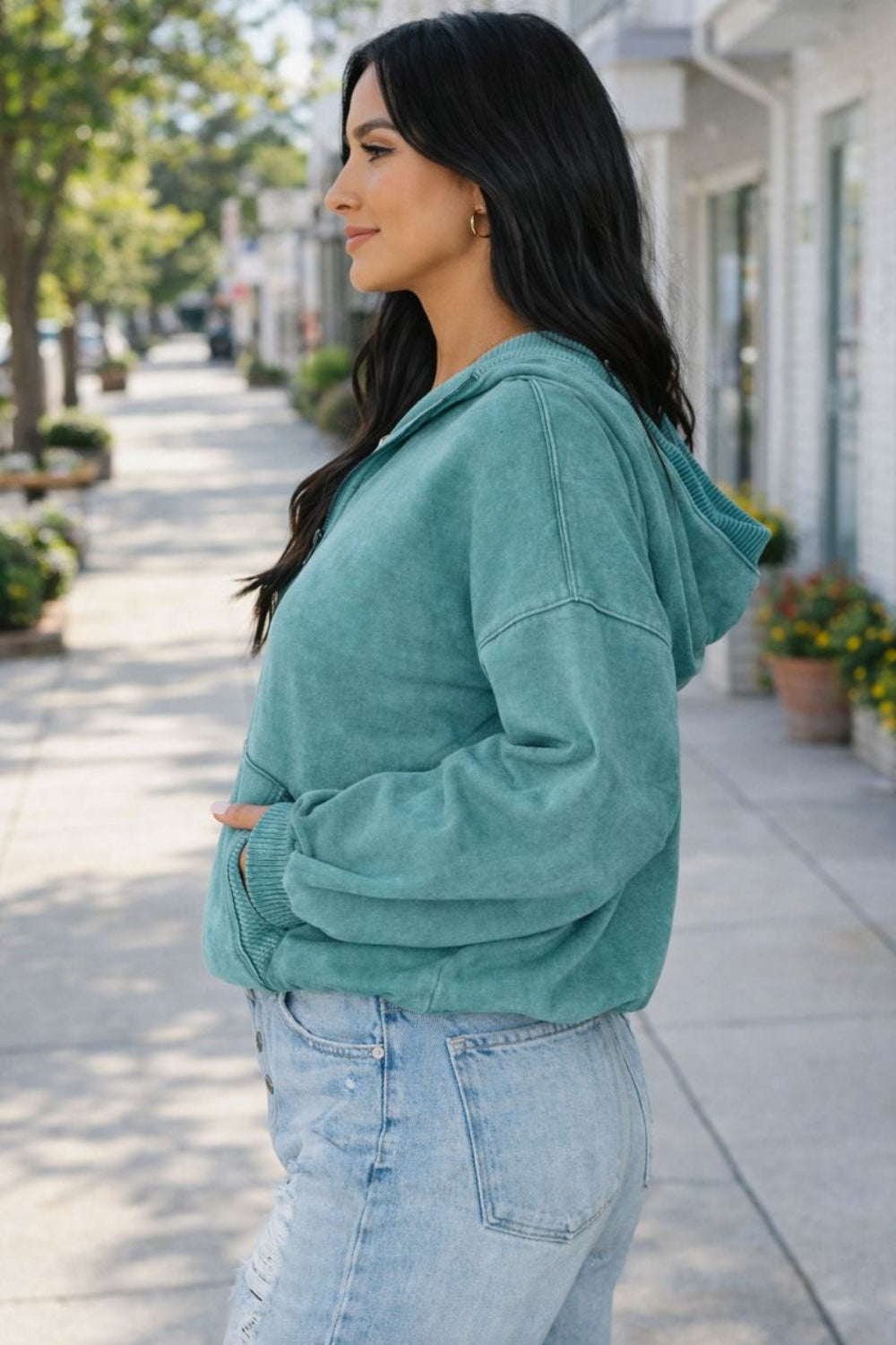 hoodie, half-zip, long sleeve, drop shoulder, kangaroo pocket, corded drawstring, ribbed, medium length, no stretch, side view