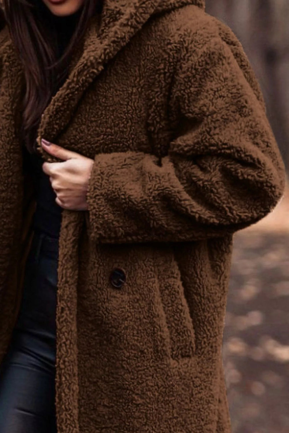 Coat, longline, lined, hooded, one button closure, pocketed, thick, oversized, slightly stretchy, close up view
