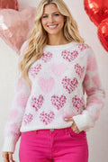 sweater, pullover, round neck, drop shoulder, ribbed neck, cuffs and hem, long sleeve, fuzzy texture, hearts with leopard print adorned with pearl trim, slightly stretchy, front view